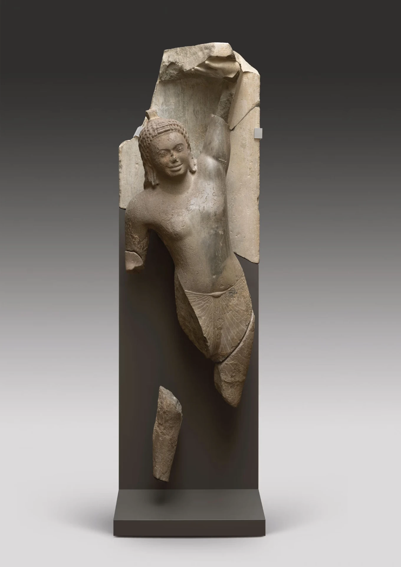 Sixth-century stone sculpture of Krishna lifting Mount Govardhana from Phnom Da, southern Cambodia